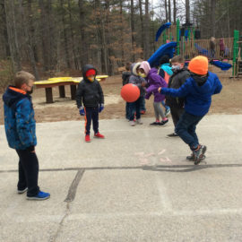 Featured image of article: Enjoying a game of 4-square at recess!