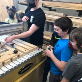 Featured image of article: ATC students from the Woodworking class share their knowledge with GES 3rd and 4th graders.